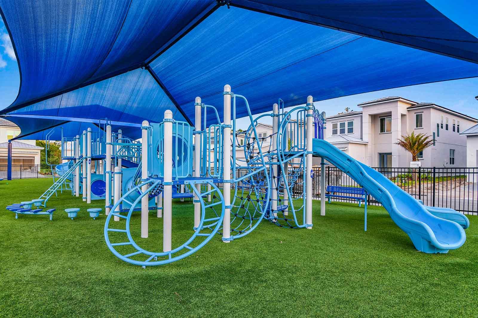Shaded central playground in the Solterra community